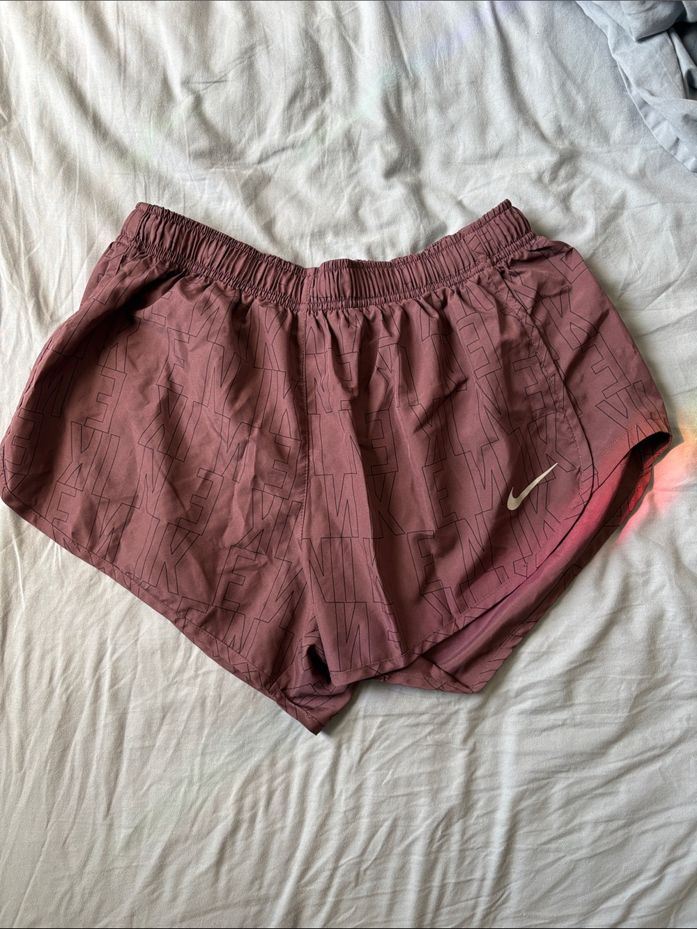 Nike Women's Mauve Athletic Running Shorts with Reflective Swoosh